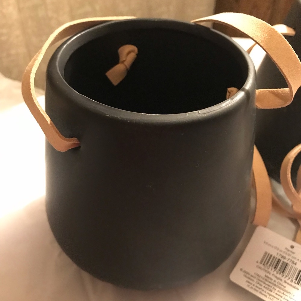 Two ceramic hanging planters